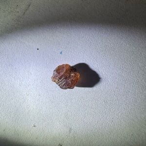 R008 - 1 Small pink/red rough sapphire crystal